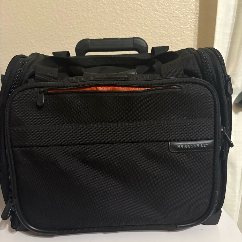 Briggs & Riley Black and Orange Travel Bag